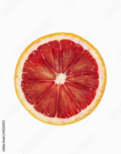 Photo: Blood Orange Slice on a White Background Blood Orange Slice on a White Background