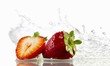 Strawberries with splashing water