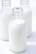 Bottles of cream, opened