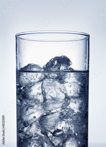 Photo: Ice cubes in glass of water Ice cubes in glass of water