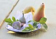 An arrangement of pears and figs