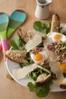 Salad with Arugula, Prosciutto, Fried Egg, Walnuts, Parmesan and Cheese Toasts