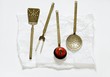 Various old kitchen utensils and a tomato