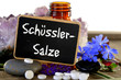 Schüsslersalze mit Tafel und Blüten