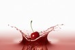A cherry falling into red juice