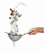 Washing mussels in a sieve