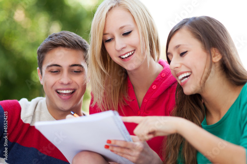 Photo: Three students smiling Three students smiling
