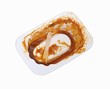 Foto: Empty container with currywurst remains in it Empty container with currywurst remains in it