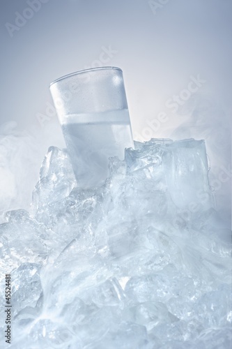 Photo: Vodka glass in a block of ice Vodka glass in a block of ice