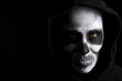 Photo: Scary skeleton on black background Scary skeleton on black background