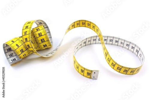 Photo: Tape measure on white background Tape measure on white background