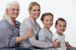 Foto: young and older female foursome young and older female foursome