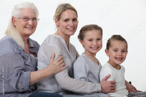 Photo: young and older female foursome young and older female foursome