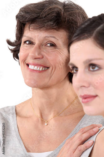 Photo: Mother supporting her daughter Mother supporting her daughter