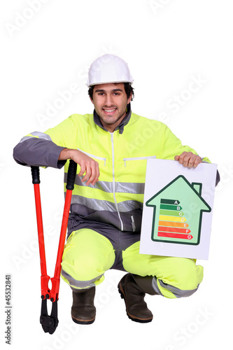 Photo: Construction worker with an energy rating symbol Construction worker with an energy rating symbol