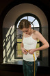 Woman Measuring Her Waist
