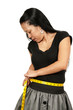Hispanic Woman Measuring Her Waist