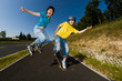 Active young people - rollerblading, running