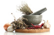 dried herbs in mortar and vegetables, isolatrd on white