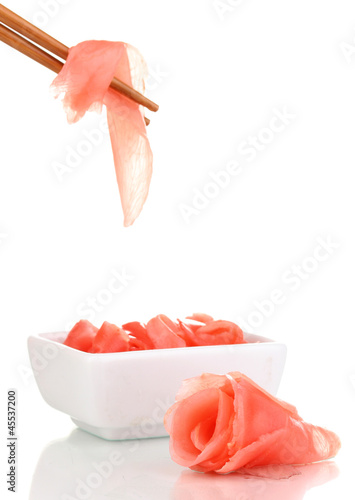 Photo: Marinated ginger slices isolated on white Marinated ginger slices isolated on white