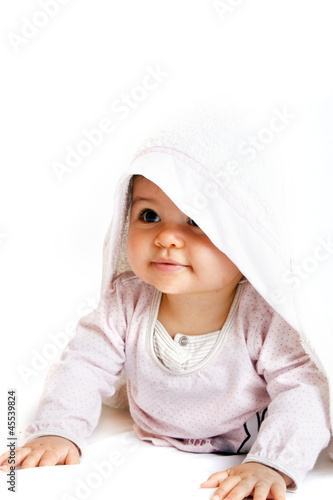 Photo: a little baby with a towel a little baby with a towel