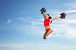 Photo: Young female cheerleader Young female cheerleader