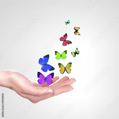 Photo: Hands releasing butterflies Hands releasing butterflies