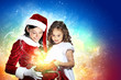 Little girl with christmas gifts and santa