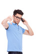 young man thumbs down on the phone