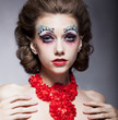 Beautiful and sexy young bright woman in necklace