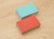 block of business cards on a wooden table