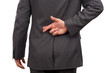 Fingers crossed behind businessmans back