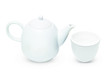Foto: Porcelain pitcher with cup and plate isolated on white Porcelain pitcher with cup and plate isolated on white