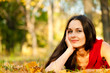 beautiful woman lying on the autumn leaves