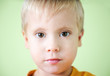 Serious cute little boy