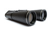 Photo: Big black binoculars isolated on white background Big black binoculars isolated on white background
