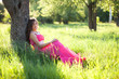 Foto: Woman in a long pink dress Woman in a long pink dress