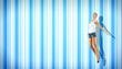 young woman dancing and jumping...