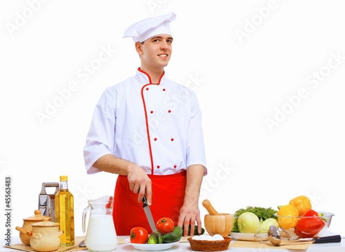 Photo: Young cook preparing food Young cook preparing food