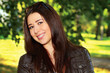 Portrait of brunette girl in the park