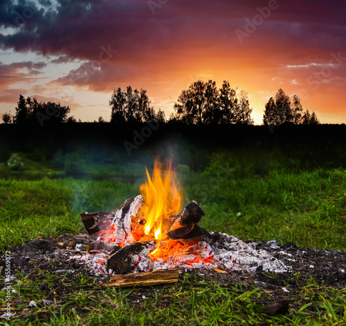Photo: Fireplace in forest at dusk Fireplace in forest at dusk