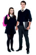 Full length portrait of students in uniform