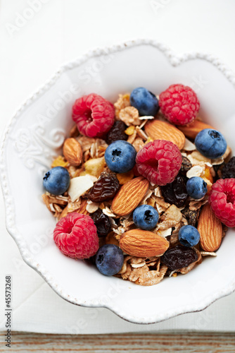 Photo: Granola with fresh fruits and almonds Granola with fresh fruits and almonds