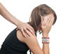 Photo: Depressed teenager sitting while hand coming from behindand off Depressed teenager sitting while hand coming from behindand off