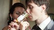 Video: Groom with fiancee drink champagne kiss Groom with fiancee drink champagne kiss