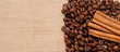handful aromatic coffee beans with cinnamon