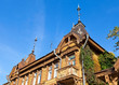 Old wooden house over blue sky in Samara, Russia