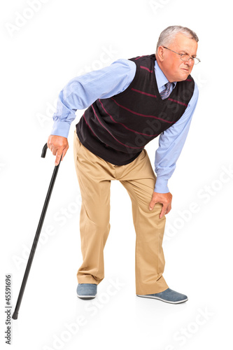 Photo: Mature man with a knee pain Mature man with a knee pain