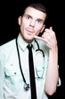 On Call Doctor Making Phone Gesture For Home Visit