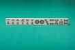 Smooth table surface with a mahjong on it